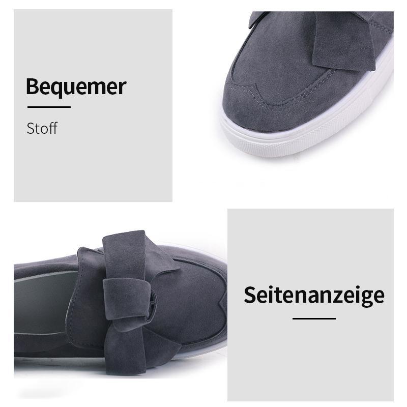 Flache Schuhe der Frauen-Bogen-Segeltuch