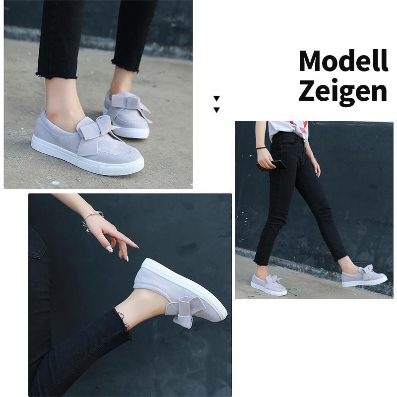 Flache Schuhe der Frauen-Bogen-Segeltuch